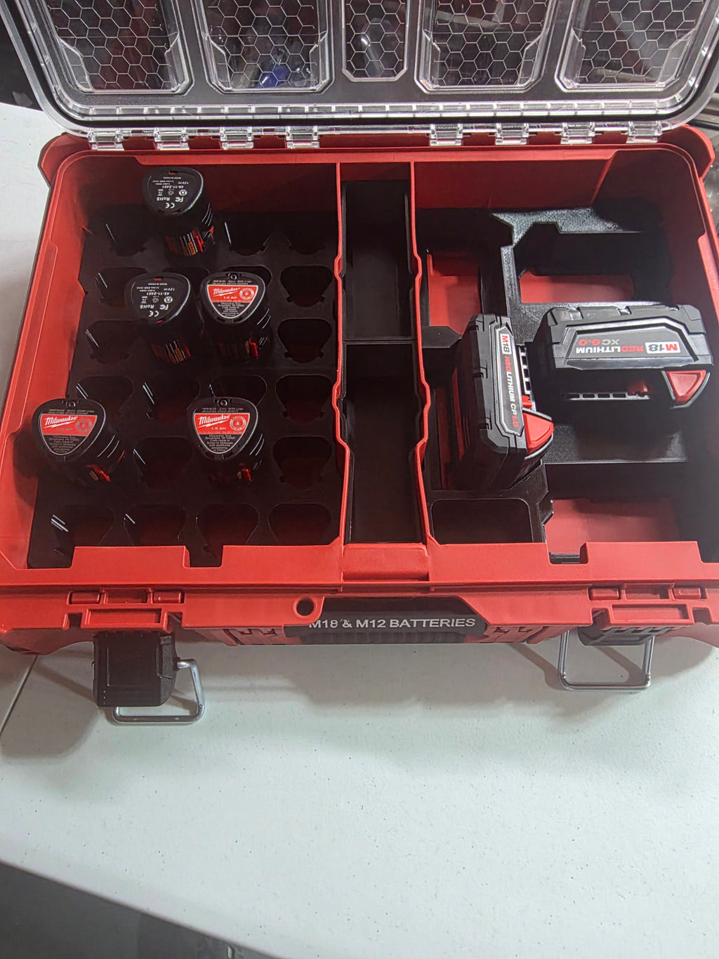 TOOL TAMERZ brand Insert for Milwaukee m18 and m12 batteries.